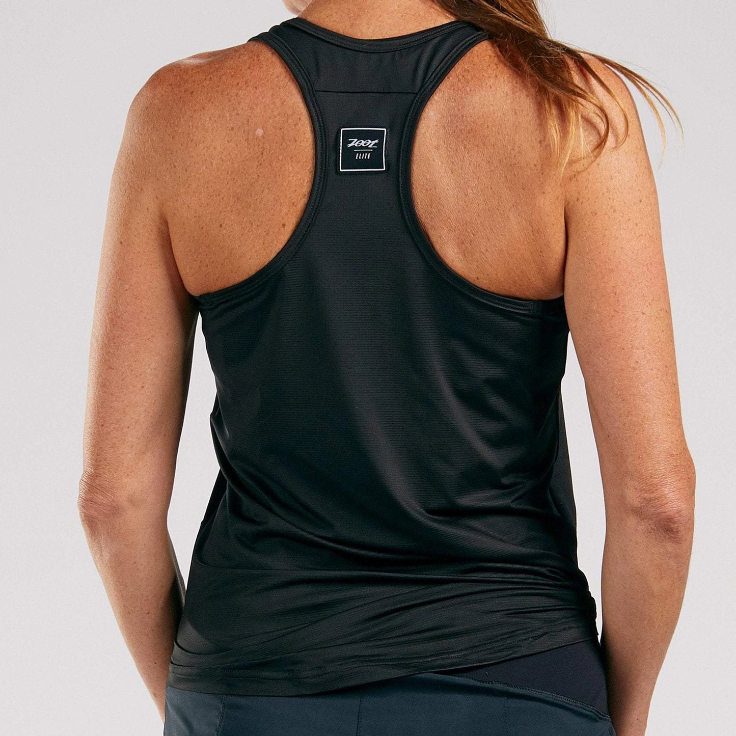 גופיית ריצה נשים ZOOT WOMANS ELITE RUN SINGLET - ELITE