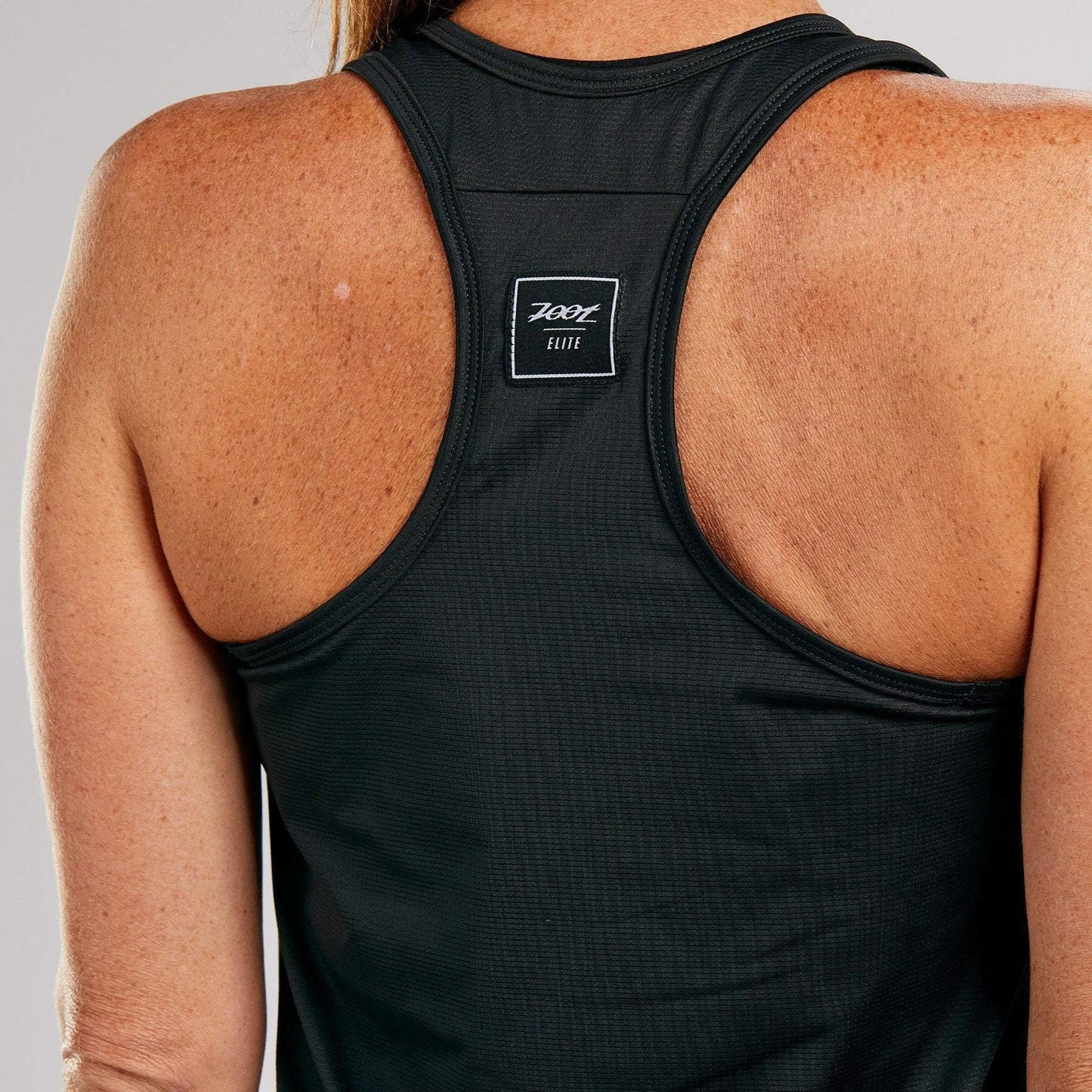 גופיית ריצה נשים ZOOT WOMANS ELITE RUN SINGLET - ELITE